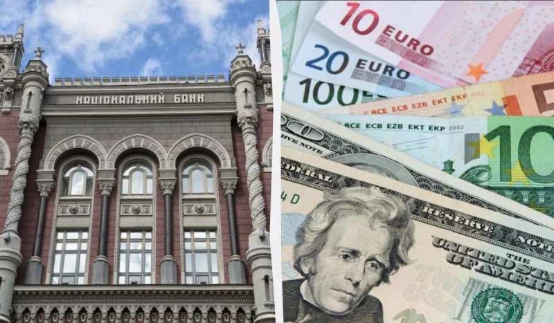 українські банкноти та монети поруч із калькулятором і папером із курсами валют