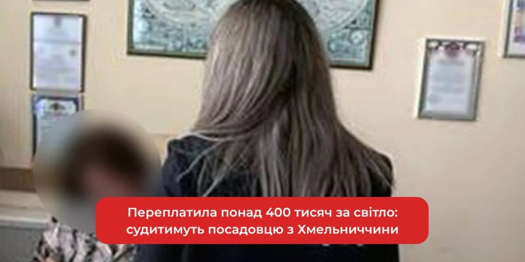 крупний план договору поруч зі счетами за електроенергію та гривнями, нейтральний фон