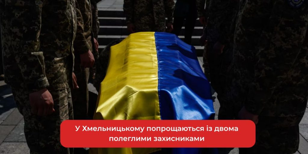 символічна сцена з військовими жетонами, вінком і свічкою, без облич