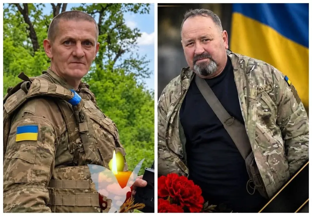 символічна композиція з шоломом, свічкою та прапором України на столі