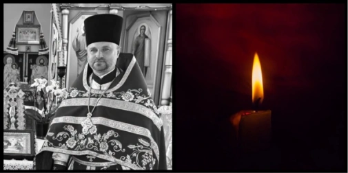 символічна натюрмортна сцена: військова форма, дерев'яний хрест, свічка і квіти на столі